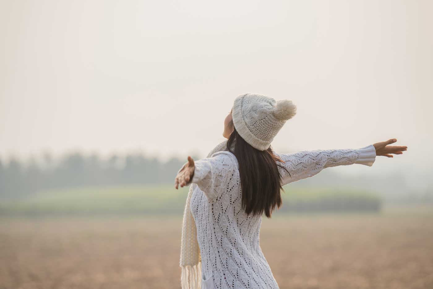 Woman celebrating in nature